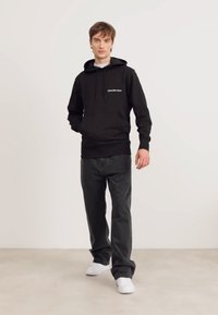 Calvin Klein Jeans INSTITUTIONAL HOODIE - Sweatshirt - black