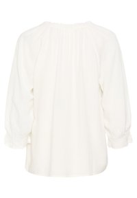 Maglione bianco con maniche lunghe arricciate e vestibilità morbida. Presenta un colletto arricciato e un tessuto leggero e leggermente trasparente.
