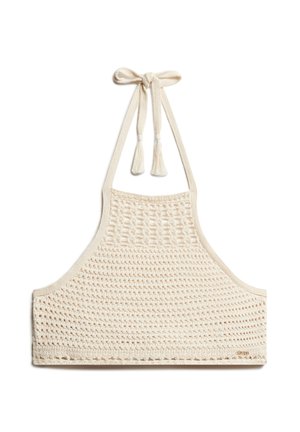 Top all'uncinetto in bianco sporco, con una trama aperta e texturizzata, legature al collo regolabili con frange e un design fitted e senza cuciture.