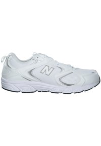White athletic shoe made of mesh and synthetic material, featuring a rounded toe, cushioned sole, and a reflective silver logo on the side.