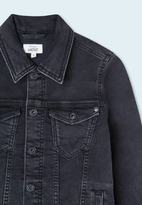 Black denim jacket featuring a classic collar, button closure, two chest pockets, and subtle stitching details. Smooth texture.