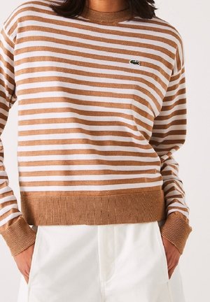Stickad tröja - beige