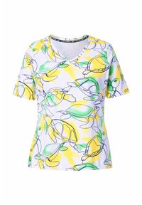 Maglietta a maniche corte con scollo a V realizzata in tessuto morbido, caratterizzata da un motivo colorato con tartarughe e limoni in giallo, verde e contorni neri su sfondo bianco.