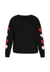 Zwart sweatshirt met lange mouwen, versierd met meerkleurige hart-applicaties in rood, roze en wit. Gemaakt van katoen met een gestructureerde afwerking.