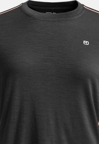 Black athletic t-shirt with a round neckline, made from textured fabric, featuring a small logo and contrasting pink stripes on the shoulders.
