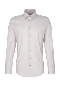 Chemise blanche à boutons avec un fin motif de pois bleu marine, manches longues, col et poche poitrine simple. Présente des boutons marron.