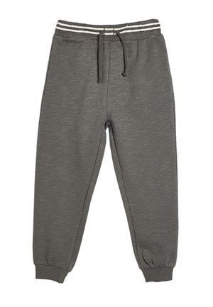 Graue Sweatpants aus strukturiertem Stoff mit einem verstellbaren Bund und weißen Streifenakzenten. Elastische Bündchen an den Knöcheln.