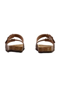 Sandales brunes avec deux sangles, boucles réglables et une semelle brun texturée. Le rembourrage présente une semelle intérieure de couleur claire avec une surface légèrement texturée.