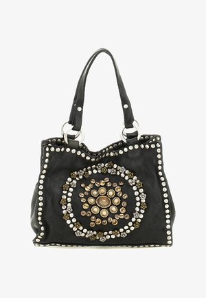 Borsa in pelle nera con due manici, decorata con motivi circolari di borchie dorate, argentate e perlacee e piccoli abbellimenti a forma di fiore.