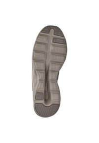 La suola della scarpa presenta una superficie in gomma testurizzata con diversi modelli di grip, principalmente in tonalità beige e grigio, con sezioni rialzate per la trazione.