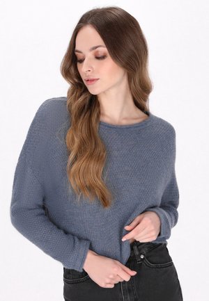 - Sweter