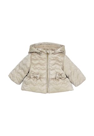 Veste matelassée beige pour tout-petit avec coutures en forme de cœur, fermeture éclair à l'avant, capuche et deux petits nœuds décoratifs à la taille.