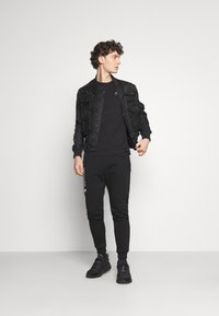 Alpha Industries BASIC - Jogginghose - black