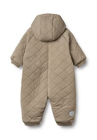 Vadderad beige snowsuit med huva, som har elastiska ärmslut och en rund logotypapplikation på det nedre benet. Slät textur och minimal design.