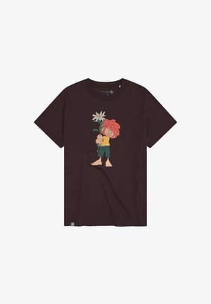 Dark brown t-shirt with cartoon character holding a large white flower, wearing yellow shirt and green shorts, barefoot.