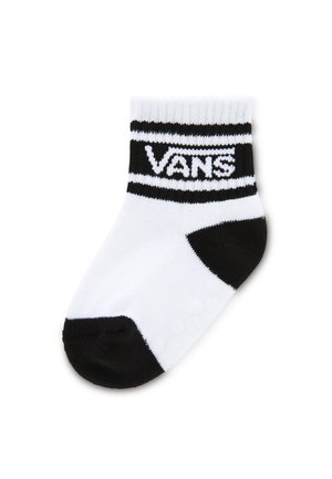 Calcetín blanco hasta la rodilla hecho de una mezcla de algodón con banda elástica negra, que presenta el logo "VANS" y dos rayas horizontales en la parte superior.