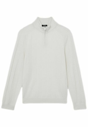 Baltas megztinis su pusiau užtrauktuku ant apykaklės, ilgomis rankovėmis ir subtiliu vertikaliu raštu. Pagamintas iš minkštos, kvėpuojančios medžiagos.