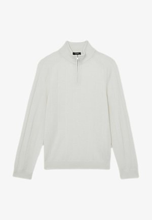 Baltas megztinis su pusiau užtrauktuku ant apykaklės, ilgomis rankovėmis ir subtiliu vertikaliu raštu. Pagamintas iš minkštos, kvėpuojančios medžiagos.