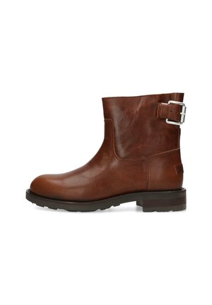 Brown leather ankle boot with a rounded toe, buckle detail on the side, textured finish, and a sturdy black rubber sole.