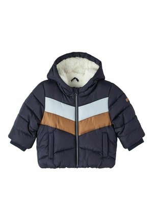Doudoune bébé bleu marine avec doublure polaire blanche, capuche, fermeture éclair devant et bandes en chevron bleu clair et marron sur la poitrine.