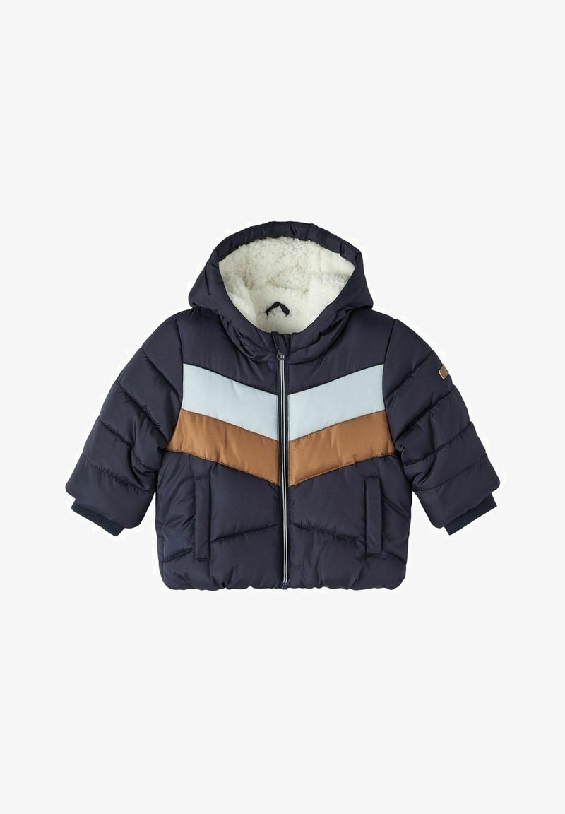 Doudoune bébé bleu marine avec doublure polaire blanche, capuche, fermeture éclair devant et bandes en chevron bleu clair et marron sur la poitrine.