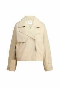 Beige cropped-takki, jossa on leveä kaulus, kaksirivinen etuvetoketju ja nappikoristeet hihoissa. Sujuva, kevyt kangas.