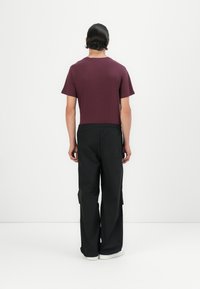 Noisy May NMCHARLIE PARACHUTE UNISEX - Pantaloni - black