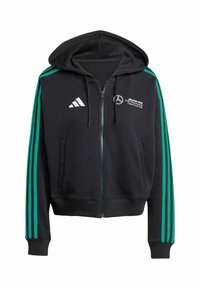 Sort lynlås hoodie med grønne striber på ærmerne, forlommer og justerbar hætte. Har hvidt logo og branding på brystet.