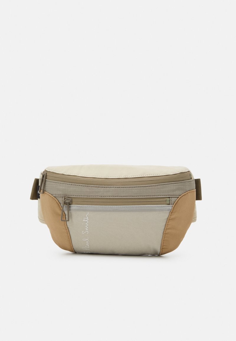 Beige en tan stoffen heuptasje met een ritsvak aan de voorkant, gestikte details en een verstelbare band voor een veilige pasvorm.