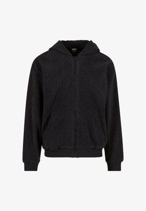 Črna zip-up kapuca z teksturiranim vzorcem, ki ima kapuco, dva sprednja žepa ter rebraste manšete in rob. Narejena iz mehkega blaga.