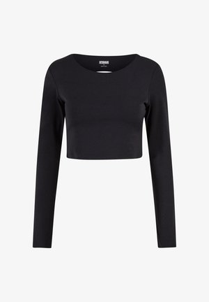 Top negro recortado de manga larga hecho de tejido elástico. Presenta un escote redondo y una silueta ajustada. Diseño simple sin patrones ni acentos.