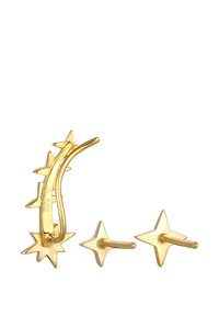 Ohrringe aus goldfarbenem Metall mit einer gebogenen Hängeschlaufe und Spikes sowie zwei sternförmigen Stecker. Glatte Textur, polierte Oberfläche.