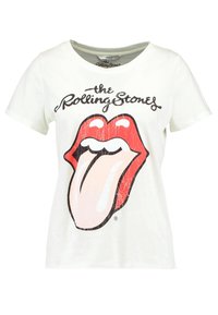 Bílá bavlněná tričko s krátkým rukávem, které má design prasklého červeného jazyka a text "the Rolling Stones" v černé barvě. Kulatý výstřih.