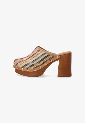 Woven multicolored clog with a wooden heel, featuring a decorative studded band and an open back. Colors include beige, pink, blue, and brown.