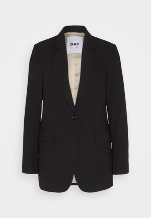 Svart blazer med strukturerte revers, enkelt frontknapp, to utvendige lommer og beige fôr. Glatt stoff med skreddersydd passform.