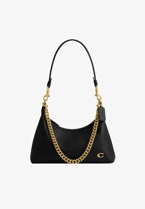 Black leather shoulder bag with thick gold chain, slim black strap, gold clasp, and small leather tag attached to the side.