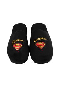 Black slippers with a soft texture, featuring embroidered "Superman" logo and emblem in red and yellow on the front. Round shape.