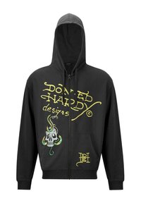 Felpa con cappuccio nera con cerniera, con testo giallo e grafica di un teschio con un serpente sul davanti. Tessuto di cotone liscio.