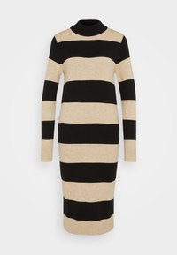 Stickad klänning med växlande svarta och beige horisontella ränder, hög halsringning och långa ärmar. Strävt tyg med midikjolslängd.
