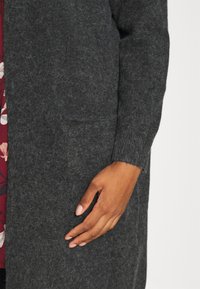 Vero Moda Curve VMCDOFFY LS LONG OPEN  NOOS - Cardigan - black