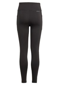 Leggings negros con cintura alta. Tejido liso y elástico con un mínimo de costuras. Presenta dos bolsillos laterales y una etiqueta de marca en la parte trasera.