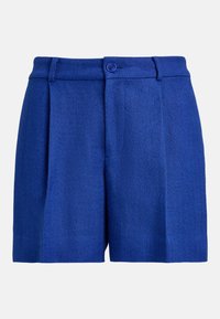 Blå sildebenmønstrede shorts med innsvingt midje, frontplisseringer og enkelt knappelukking, laget av strukturert stoff.