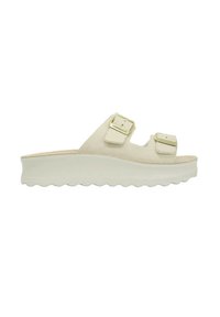 Sandali platform crema con due cinturini regolabili a fibbia, realizzati in materiale texture, con suola in gomma ondulata e design minimalista.
