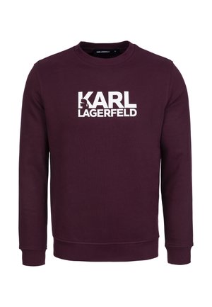 Burgundská mikina s dlouhým rukávem, kulatým výstřihem a bílým logem "KARL LAGERFELD" výrazně umístěným na přední straně. Měkká textilie.