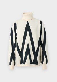 Pull à col roulé crème avec motifs géométriques en zigzag noirs et poignets et ourlet côtelés.