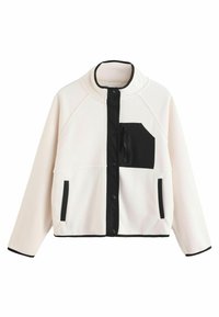 Weiße Fleecejacke mit schwarzen Akzenten. Verfügt über eine Reißverschlusstasche, Druckknöpfe und einen hohen Kragen. Weicher Stoff und Raglanärmel.