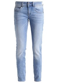 Světle modré džínové kalhoty s úzkým střihem, pěti kapsami, zakončeným lemem a jemnými vybledlými vzory na nohách pro opotřebovaný vzhled.