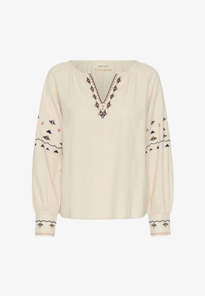 Crème kleurige blouse met lange mouwen, voorzien van een V-hals, geborduurde patronen in marineblauw en perzik, met elastische manchetten en een relaxte pasvorm.