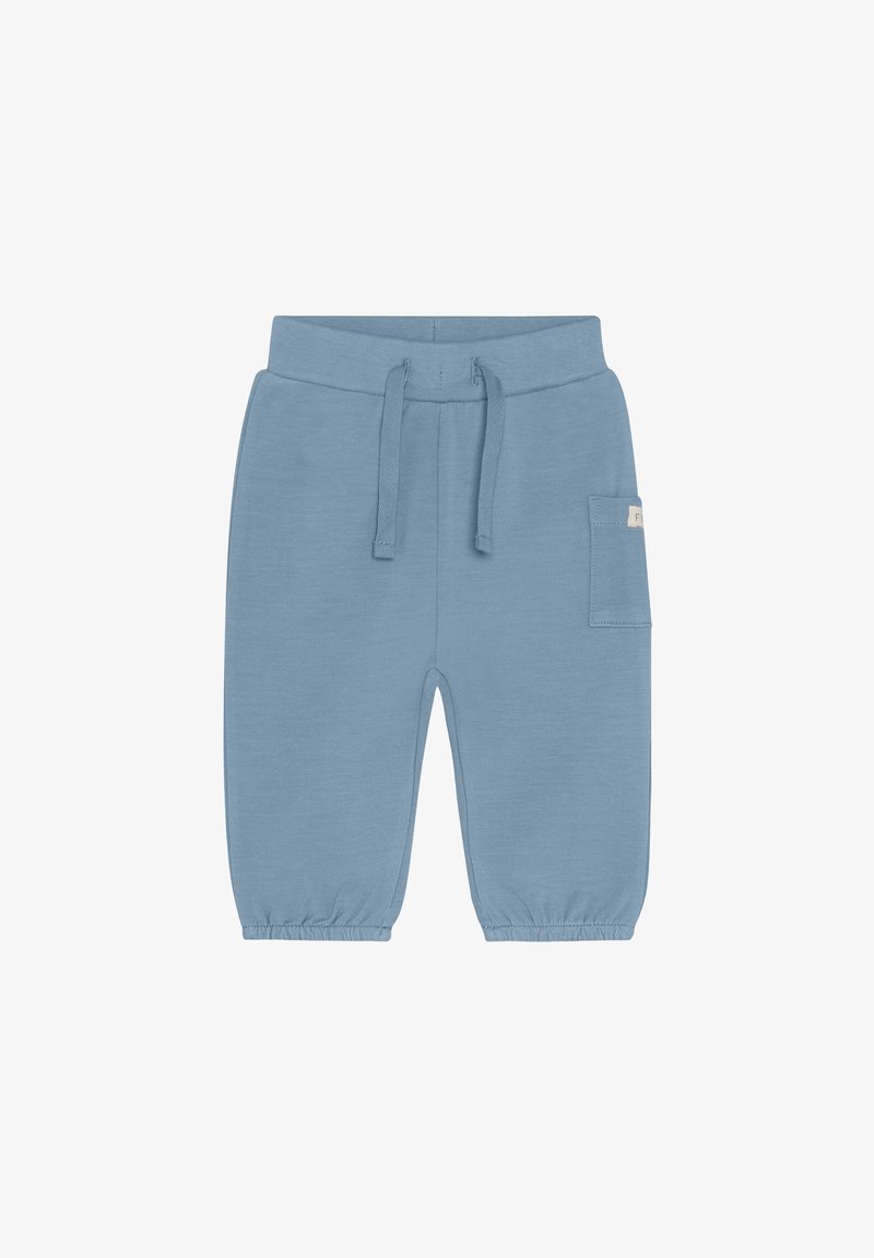 Pantalon de survêtement bleu clair en tissu doux, doté d'une taille élastique avec cordons, de poignets resserrés et d'une poche latérale avec une étiquette.