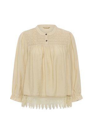 Cremefarbene Langarmbluse mit geraffter Brustpartie, rundem Ausschnitt, Knopfleiste, weitem Schnitt und Spitzenbesatz am Saum.